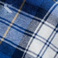 Tela de sarga 100% algodón teñida en hilo con estampado a cuadros, estilo franela, nueva moda 2026, directa de fábrica, para camisas y faldas de niño.