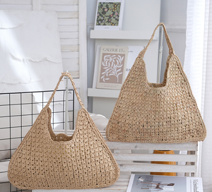 Adoptez le style estival pur avec ce sac élégant en fil naturel, doté d'un design tissé simple et d'une bandoulière confortable. - Product Image 6