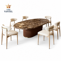 Table à manger en travertin sur mesure Vantel et chaises rembourrées pour projet d'aménagement intérieur de villa de luxe Vente en gros B2B