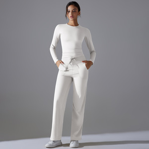 Nouvel ensemble de yoga 2 pièces pour femme, automne-hiver, asymétrique, coupe ajustée, manches longues, couleur unie, antibactérien, avec pantalon large légèrement évasé - Product Image 4
