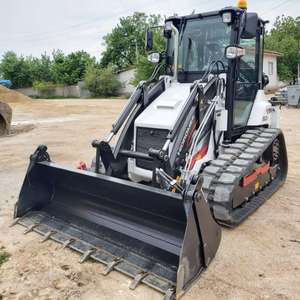 Chargeuse compacte sur chenilles Hidromek 62T blanche, capacité nominale de 2 tonnes, rétrocaveuse, moteur diesel Eaton 75KW, godet de 0,4 m³, pompe, boîte de vitesses, PLC - Product Image 1
