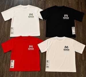 Collection de t-shirts tendance Madeon Hard Fashion, design graphique audacieux avec croix, streetwear pour hommes, mode urbaine - Product Image 1