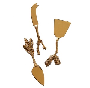Ensemble de couteaux à fromage élégant avec manche en feuille Couverts de luxe en acier inoxydable finis en or Idéal pour accueillir des cadeaux Décoration de salle à manger - Product Image 1