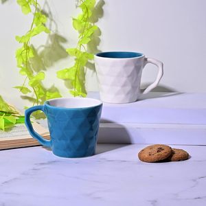 Juego de Tazas de Té de Cerámica en Dos Tonos Azul y Blanco con Textura (Juego de 4) - Product Image 1