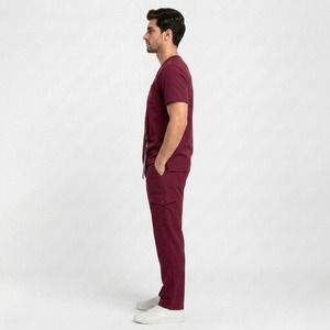 Traje quirúrgico premium para el cuidado de la salud, ofrece comodidad transpirable, apariencia elegante y diseño funcional para el uso diario de los profesionales médicos. - Product Image 3