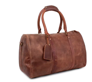 Sac de voyage en cuir véritable, fabriqué avec des matériaux de qualité supérieure, offre durabilité et un toucher luxueux, intérieur spacieux. - Product Image 2