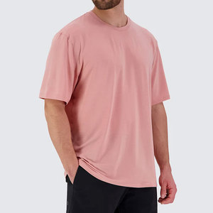 ผู้ผลิตเสื้อผ้า OEM ขายส่ง เสื้อยืดโอเวอร์ไซส์ทรงหลวมสำหรับทุกเพศ แบบเรียบ ไม่มีลาย พิมพ์โลโก้ตามสั่ง ผ้าฝ้าย 100% แห้งเร็ว - Product Image 4