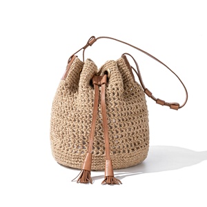 OEM ODM กระเป๋าทรงถังปอกระเจาถักพร้อมด้วยหนังพู่รายการฤดูร้อนที่จำเป็นสำหรับคอลเลกชันชายฝั่งของรีสอร์ทผลิตในบังคลาเทศ - Product Image 1