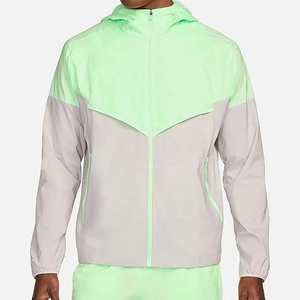 เสื้อแจ็คเก็ตแบบ unisex ผ้า softshell สีพื้น มีฮู้ด ปิดด้วยซิป น้ำหนักเบา เหมาะสำหรับกิจกรรมกลางแจ้ง ทรงปกติ สีเขียวอมเทา คอตั้ง - Product Image 1