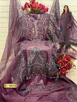 Le luxe dans chaque détail : élégant shalwar kameez en organza brodé à la main avec un bas et une doublure en santoon de qualité supérieure.
