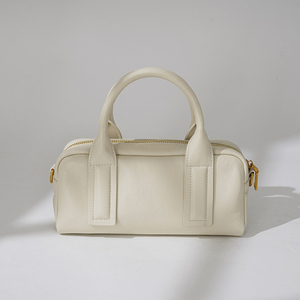 Bolso de Mano Minimalista de Cuero Genuino Blanco en Forma de Barril con Cierre de Cremallera y Dos Asas para Uso Diario de Mujer - Product Image 1
