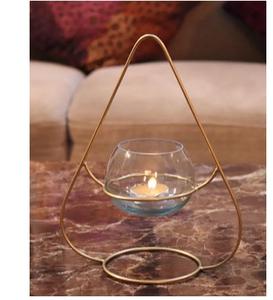 Increíble portavelas metálico con diseño floral que transforma una vela sencilla en una pieza de arte luminosa fascinante. - Product Image 4