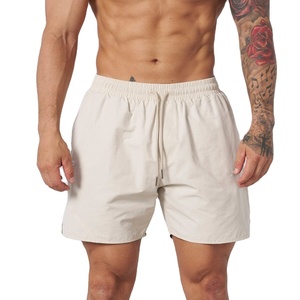 Pantalones cortos de gimnasio para hombre con logotipo personalizado 2025, estilo callejero, patrón sólido, joggers de poliéster ligero, pantalones cortos para correr de verano de 5 pulgadas - Product Image 1