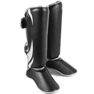Protège-tibias en cuir PU noir avec fermeture auto-agrippante pour la protection sportive des adultes, design léger - Product Image 2
