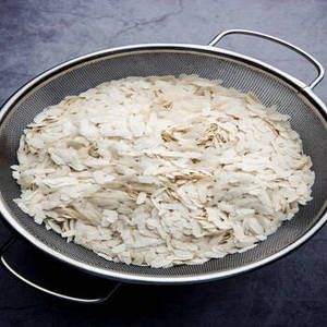 Flocons de riz Poha blanc cru indien de saison fraîche en vrac pour la distribution en gros aux épiceries et les applications alimentaires commerciales - Product Image 1