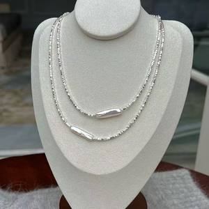 สร้อยคอมุกหรูหราสำหรับผู้หญิง ปี 2025 ดีไซน์ลูกปัดอเนกประสงค์ ประดับด้วยแท่งเงินแท้แบบแตก ครอบคลุมกระดูกไหปลาร้า - Product Image 1