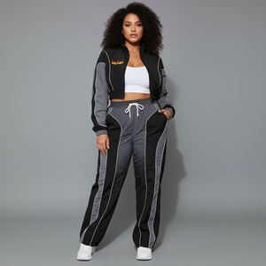 Survêtement sportif grande taille pour femme, noir et gris, avec blocs de couleur, pantalon long à col roulé et cordon de serrage avec poches latérales, collection automne - Product Image 1