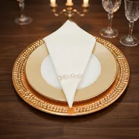 Assiette de service en cuivre artisanale avec texture martelée, décoration de table rustique et luxueuse, set de table