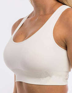 ZULARI IMPEX Soutien-gorge de sport sans manches sans couture couleur unie ajusté pour femme en coton avec fermeture éclair 2-en-1 - Product Image 1