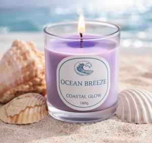 Vela perfumada Ocean Breeze Coastal Glow hecha con cera de primera calidad y vertida en un elegante frasco de vidrio transparente. - Product Image 2