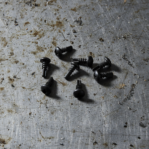 Tornillos de Anclaje para Concreto PDC Modelo 11 de Alta Resistencia con Cabeza Plana - Acero al Carbono con Recubrimiento Negro, Accionamiento Phillips, Grado 4.8, 6.8 Pulgadas - Product Image 1