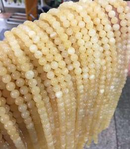 Perles de jade malaisien jaunes rondes et lisses, pierres précieuses naturelles pour la fabrication de bijoux DIY, vente en gros - Product Image 1