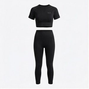 Ensemble de yoga 2 pièces North Approach, haut court noir uni, leggings taille haute, tissu respirant, sans couture, vêtements de sport pour femmes - Product Image 1