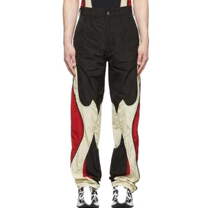 Pantalones de chándal de nailon de verano a la moda personalizados para hombre, pierna ancha, transpirables, antiarrugas, diseño de bloque de Color bordado personalizado de talla grande - Product Image 1