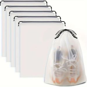 Set di 5 Borse da Viaggio Trasparenti con Coulisse, Impermeabili e Multiuso per Vestiti, Scarpe e Cosmetici - Product Image 1