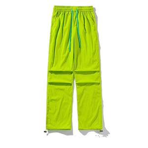 Pantalon cargo parachute vert, taille élastique, coupe ample, longueur intégrale, séchage rapide, 100% polyester, couleur unie, cordon de serrage aux chevilles, décontracté - Product Image 1