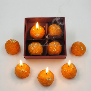 Artisanal Festive Ladoo Wax Art – Intricate Textured Soy Wax Spiritual Decor - Product Image 1