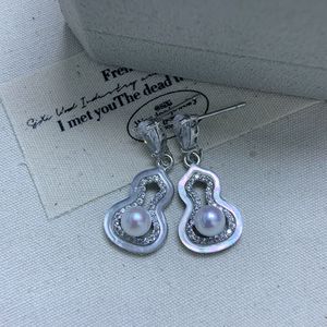 ต่างหูมุกน้ำจืดทรงหยดน้ำ ขนาด 5-6 มม. คุณภาพเยี่ยม ดีไซน์หรูหรา ทรงกลม ไร้ตำหนิ สีออโรร่า ธรรมชาติ ให้ลุคที่อ่อนโยนและสง่างาม - Product Image 3