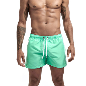 Quick Dry Lightweight Breathable Solid Polyester Mid Waist Drawstring Closure Front Logo Patchwork <b>Mens</b> Athletic Casual <b>Shorts</b> - Product Image 4