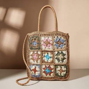 Présentez votre style artisanal unique avec ce magnifique sac en fil naturel, orné de motifs carrés au crochet et d'un corps robuste. - Product Image 3