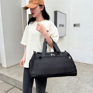 Gray Nylon Duffle Bag Rectangular Shape Zipper Closure Shoulder Strap 20-36L Capacity Water Resistant Workout Use - Product Image 5