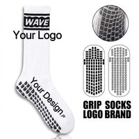 Chaussettes de football de printemps avec grip en silicone pour jeunes hommes, vente en gros, chaussettes de football antidérapantes, chaussettes de sport en tissu éponge rembourrées ODM