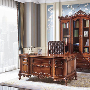 Grand Living Armand French writing <b>desk</b> is crafted from mahogany and features intricate hand carved details and a distinctive - Product Image 1