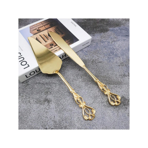 Vintage-inspired handcrafted stainless steel cake server with artistic and polished mirror finished for refined dining - Product Image 1