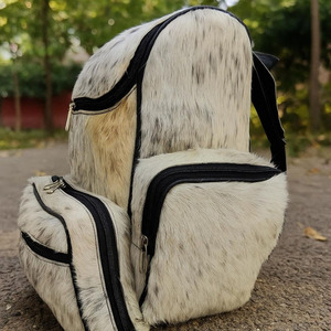 Premium cowhide leather hair on student <b>backpack</b> wholesale supplier OEM custom branding export school bags for sale in low price - Product Image 4