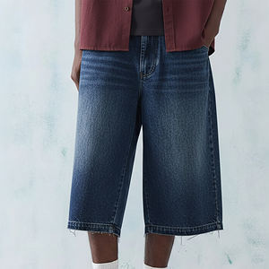 Pantalones Cortos Vaqueros Baggy con Bajo Deshilachado y Pedrería, Hechos a Medida OEM/ODM, con Logotipo Bordado y Aplicaciones Personalizadas, Ideales para Verano - Product Image 1