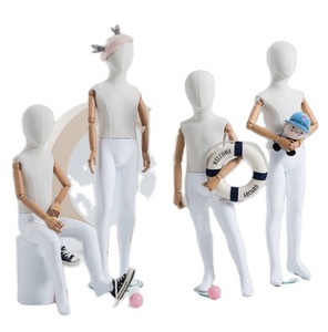 Maniquí de pie de fibra de vidrio para niños con cabeza de huevo - Product Image 1