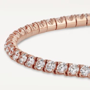Bracelet tennis rond en or rose de luxe avec diamants pour femme, bijou élégant et minimaliste, idéal pour les soirées chics. - Product Image 5