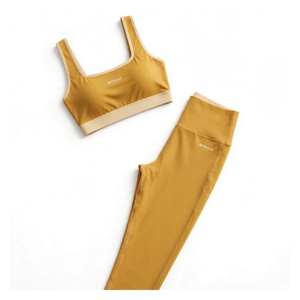 Conjunto de Yoga para Mujer Amkoor de 2 Piezas: Sujetador Deportivo con Espalda Cruzada y Cuello Redondo, Leggings de Cintura Alta y Largo Completo, Color Mostaza Sólido, Transpirable, Spandex - Product Image 4
