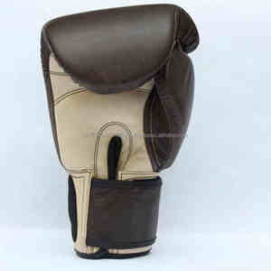 Gants de boxe pour enfants personnalisables OEM en cuir PU engrenages d'entraînement avec des caractéristiques de sécurité extensibles conception et logo personnalisés - Product Image 3