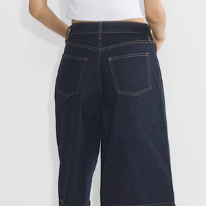 Diseño de logotipo personalizable / Pantalones cortos para mujer con diseño de bolsillos laterales y cierre de botones, con diseño de alta calidad a precio económico. - Product Image 5