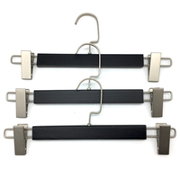 Pinces à pantalons en bois noir modernes de qualité supérieure, personnalisables avec logo, taille adaptée aux magasins de vêtements, aux armoires domestiques et à l'usage domestique