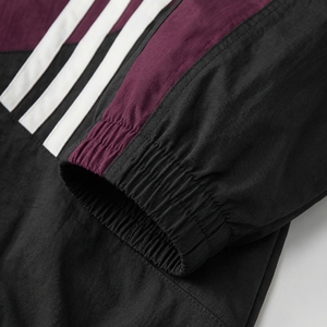 Chaqueta Cortavientos Negra con Rayas Marrones |   Chaqueta Deportiva Retro con Bloques de Color |   Chaqueta Bomber Extra Grande con Cuello Alto |   Fabricante OEM Personalizado - Product Image 4