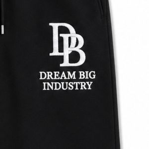 กางเกงวอร์มขายาวสีดำปักโลโก้ DB ด้วยผ้าขนหนูสีขาวสำหรับผู้ชาย รุ่น Dream Big Industry ทรงขากว้าง ผลิตจากผ้าฟลีซ รับผลิตแบบ OEM ODM ขายส่ง - Product Image 6