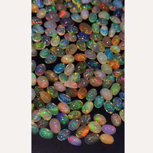 โอปอลเอธิโอเปียธรรมชาติ 651 ชิ้น พร้อมประกายไฟ ขนาด 6x4 มม. รูปทรงวงรี คาโบชอง น้ำหนัก 211 กะรัต คุณภาพดีจาก Iroc Sales อัญมณีหลวม ราคา 169 ดอลลาร์สหรัฐ - Product Image 3