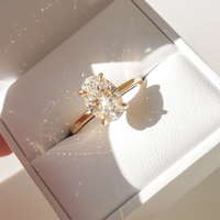 Bague de fiançailles et de mariage minimaliste en or jaune 14 carats avec diamant de laboratoire ovale de 2 carats certifié IGI, halo caché et fantaisie légère